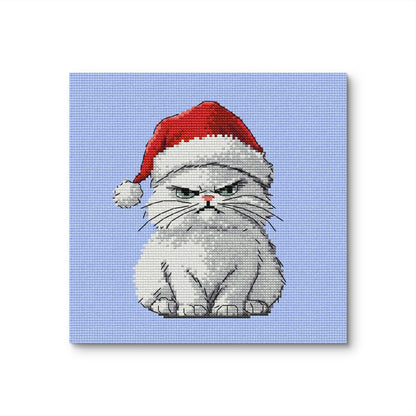 Grumpy cat in a Santa hat